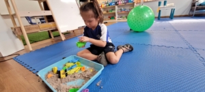 Rylae-Ann playing at school